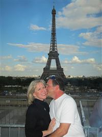 John Kisses Linda in Front of the Eiffel Tower
