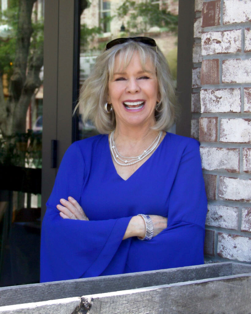 Motivational Speaker Linda Larsen Outside on Porch for Print