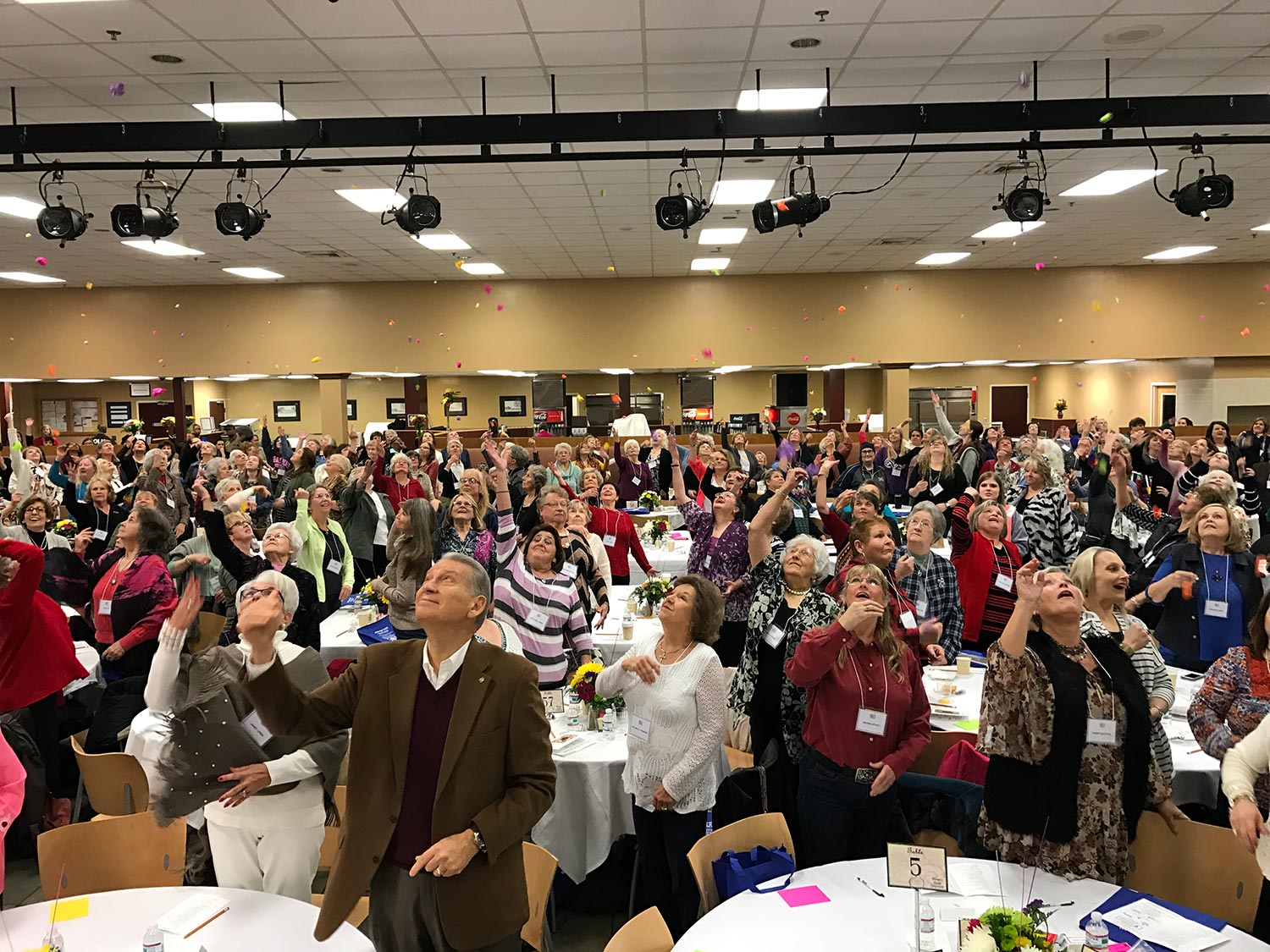 Motivational Speaker Linda Larsen's Audience Looking Up and Having Fun