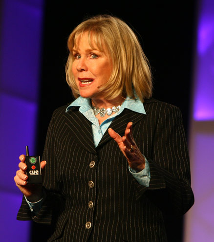 Motivational Speaker Linda Larsen with Cue Controller in Hand