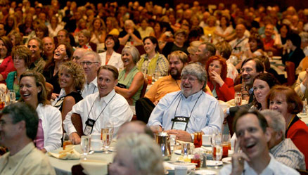 Motivational Speaker Linda Larsen Audience Laughs with Her